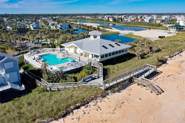 50 Nantucket Dr, Palm Coast, FL 32137 - aerial view of residential area with a nearby body of water and a pool area
