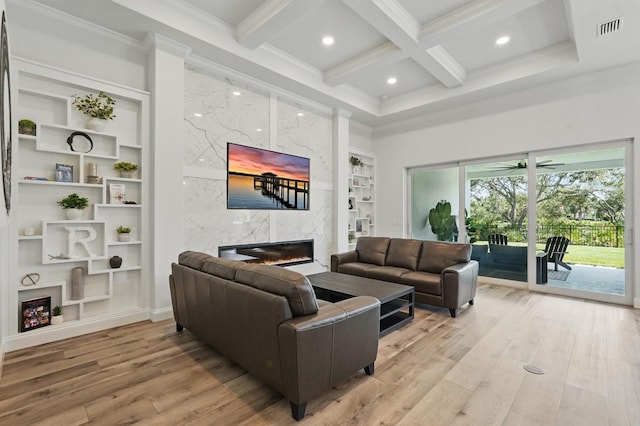 17 Kingfisher Ln, Palm Coast, FL 32137 - living area featuring a premium fireplace, coffered ceiling, light wood-style floors, crown molding, and recessed lighting