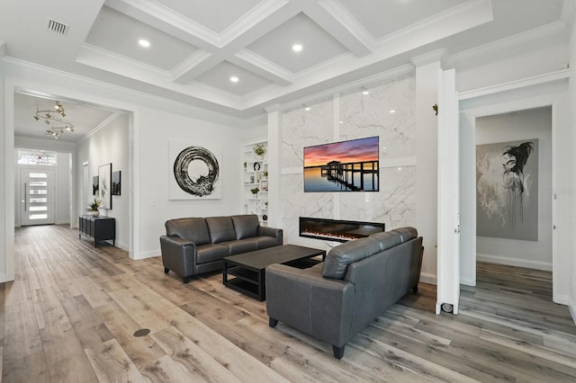 17 Kingfisher Ln, Palm Coast, FL 32137 - living room with crown molding, a high end fireplace, coffered ceiling, baseboards, and light wood-style flooring