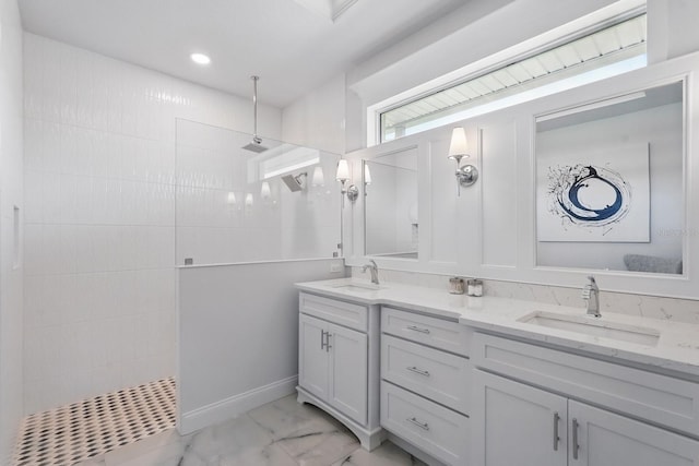17 Kingfisher Ln, Palm Coast, FL 32137 - full bath with marble look tiles, walk in shower, and double vanity