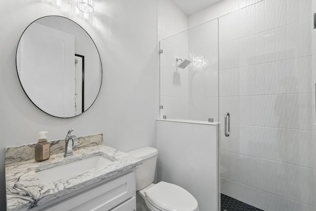 17 Kingfisher Ln, Palm Coast, FL 32137 - bathroom featuring a stall shower, toilet, and vanity