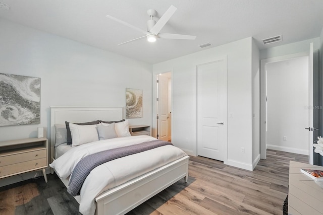 17 Kingfisher Ln, Palm Coast, FL 32137 - bedroom with wood finished floors, baseboards, and ceiling fan