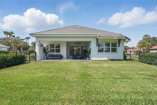 17 Kingfisher Ln, Palm Coast, FL 32137 - back of house featuring a ceiling fan, stucco siding, outdoor lounge area, and a patio area