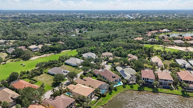 17 Kingfisher Ln, Palm Coast, FL 32137 - aerial perspective of suburban area with a large body of water and a golf club