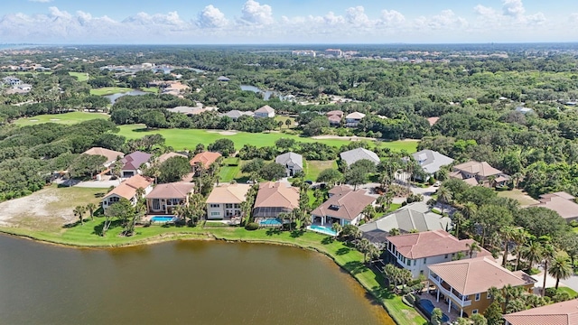 17 Kingfisher Ln, Palm Coast, FL 32137 - aerial perspective of suburban area featuring a large body of water and a local golf course