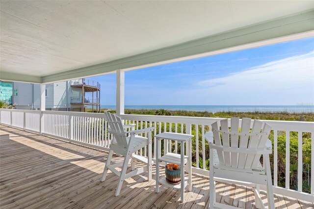 6973 N Oceanshore Blvd, Palm Coast, FL 32137 - wooden deck with a water view