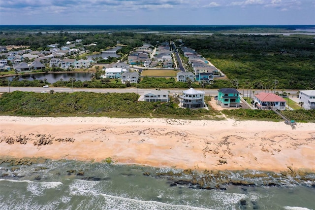 6973 N Oceanshore Blvd, Palm Coast, FL 32137 - bird's eye view of waterfront with a beach