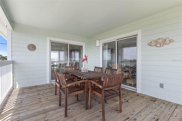 6973 N Oceanshore Blvd, Palm Coast, FL 32137 - sunroom / solarium featuring outdoor dining space