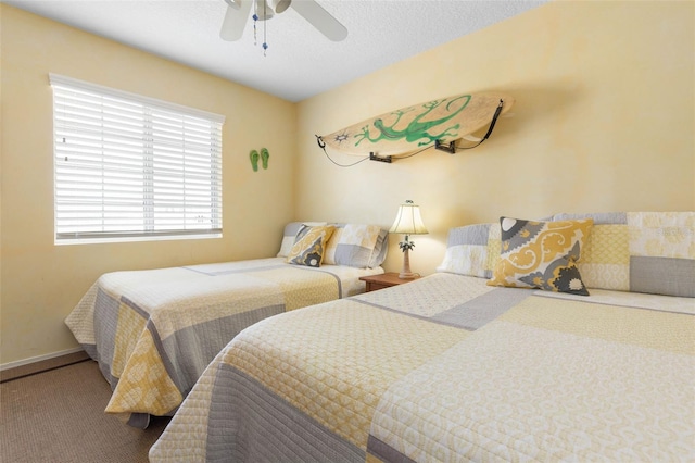 6973 N Oceanshore Blvd, Palm Coast, FL 32137 - carpeted bedroom featuring ceiling fan