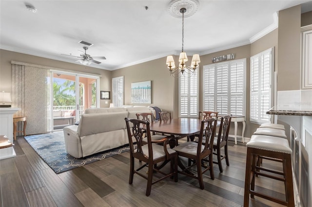 35 Ocean Crest Way Unit 1131, Palm Coast, FL 32137 - dining room with dark wood-style flooring, ornamental molding, ceiling fan with notable chandelier, and visible vents