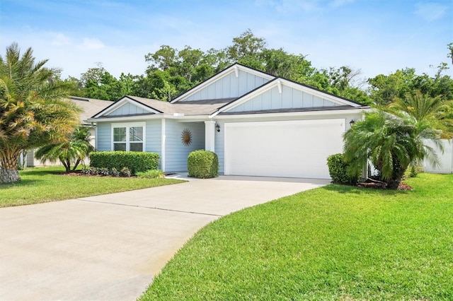 ranch-style house with board and batten siding, driveway, an attached garage, and a front yard