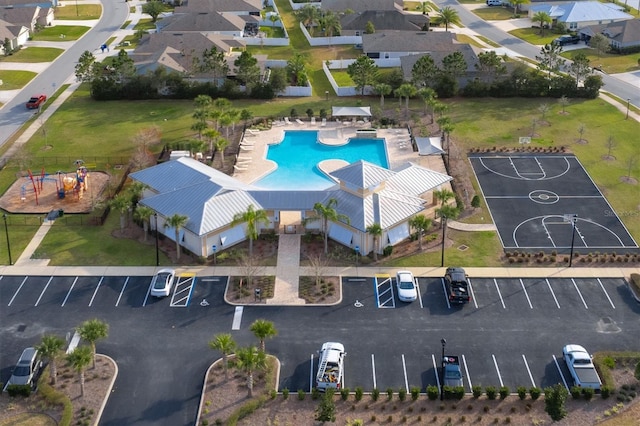 drone / aerial view of a pool