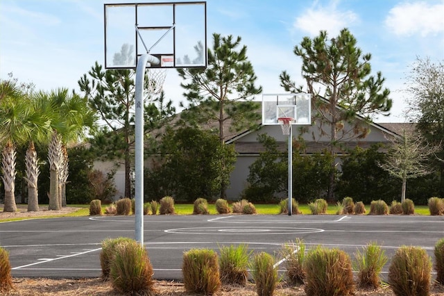 view of sport court featuring basketball hoop