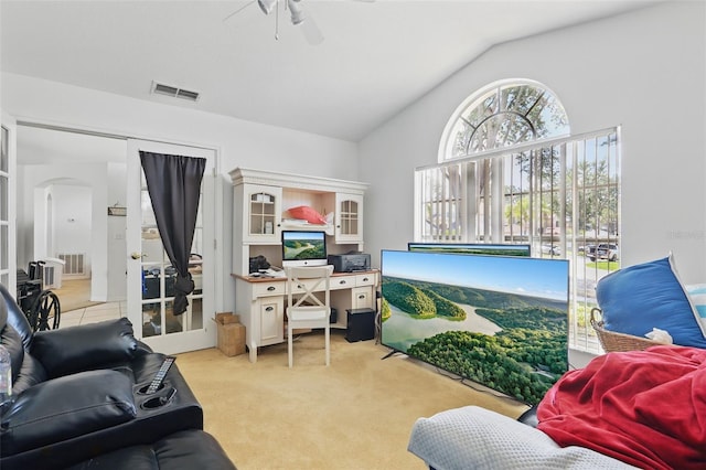 1956 Southern Dunes Blvd, Haines City, FL 33844 - home office featuring arched walkways, vaulted ceiling, ceiling fan, and light colored carpet