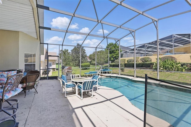 1956 Southern Dunes Blvd, Haines City, FL 33844 - swimming pool featuring a patio, a lanai, and a yard