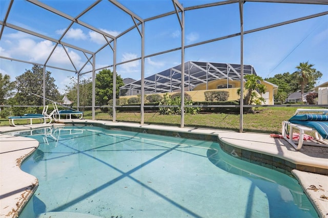 1956 Southern Dunes Blvd, Haines City, FL 33844 - swimming pool with a patio, a yard, and a lanai