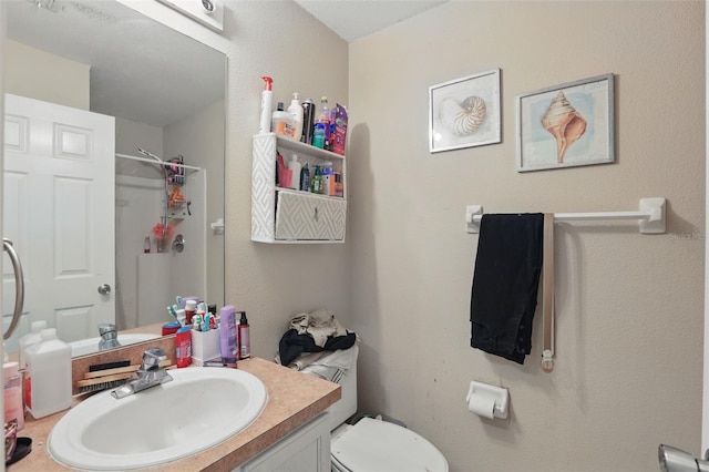 1305 Rebecca Dr, Haines City, FL 33844 - bathroom featuring toilet, vanity, and a shower