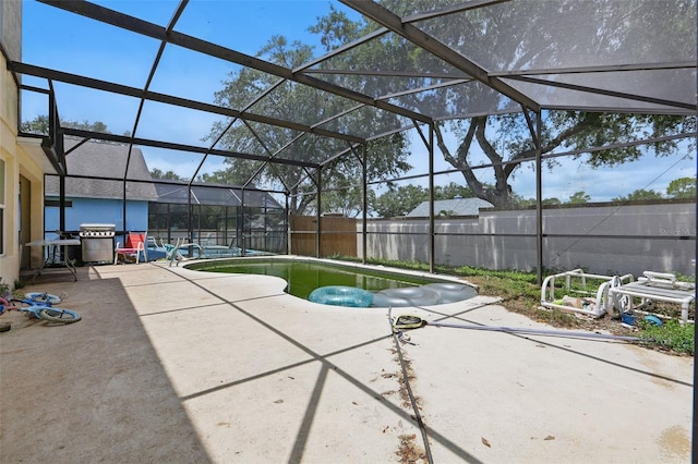 1305 Rebecca Dr, Haines City, FL 33844 - view of swimming pool with a patio, a fenced backyard, a lanai, and area for grilling