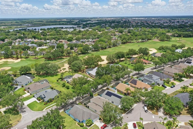 1305 Rebecca Dr, Haines City, FL 33844 - aerial perspective of suburban area featuring a large body of water and a local golf course