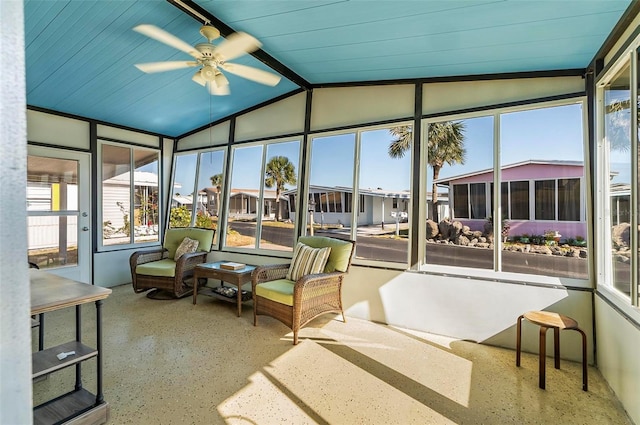 151 Lookout Dr, Flagler Beach, FL 32136 - sunroom with ceiling fan, vaulted ceiling, and a residential view