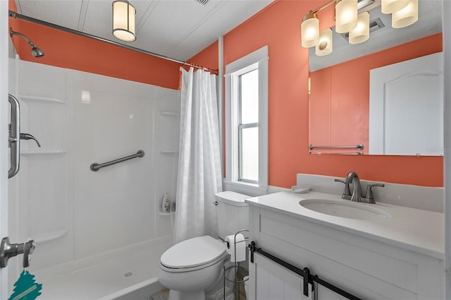 151 Lookout Dr, Flagler Beach, FL 32136 - full bathroom with a shower stall, toilet, and vanity