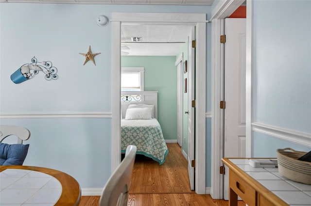151 Lookout Dr, Flagler Beach, FL 32136 - bedroom with light wood-style flooring