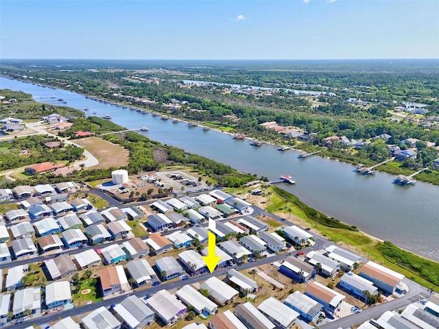 151 Lookout Dr, Flagler Beach, FL 32136 - aerial view of property's location featuring a large body of water and nearby suburban area