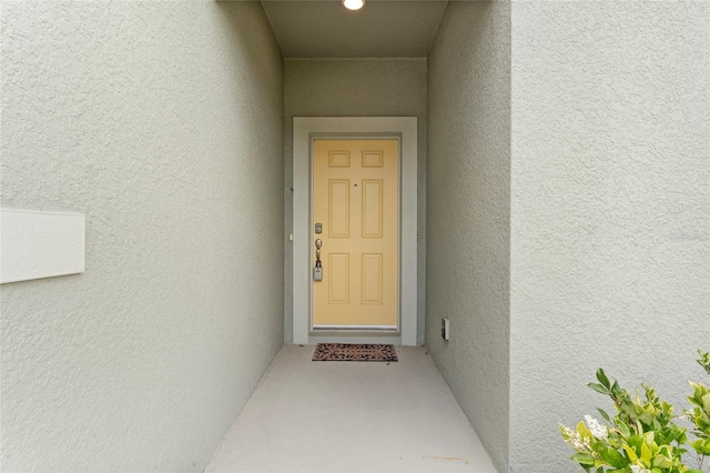 3 Oakleaf Way, Palm Coast, FL 32137 - entrance to property featuring stucco siding