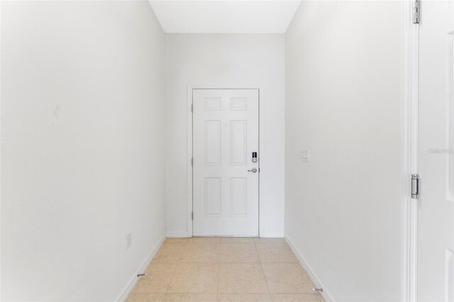 3 Oakleaf Way, Palm Coast, FL 32137 - corridor with light tile patterned flooring and baseboards