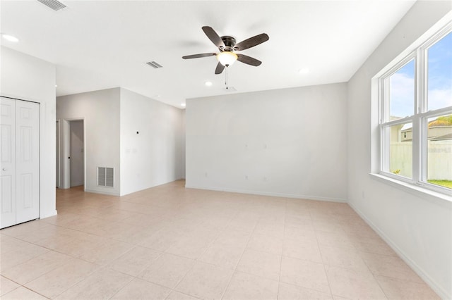 3 Oakleaf Way, Palm Coast, FL 32137 - spare room featuring ceiling fan, healthy amount of natural light, recessed lighting, and baseboards