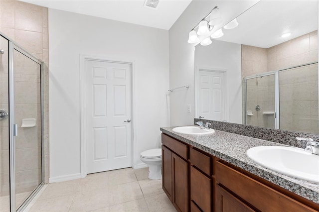 3 Oakleaf Way, Palm Coast, FL 32137 - full bathroom with a stall shower, tile patterned flooring, double vanity, and toilet