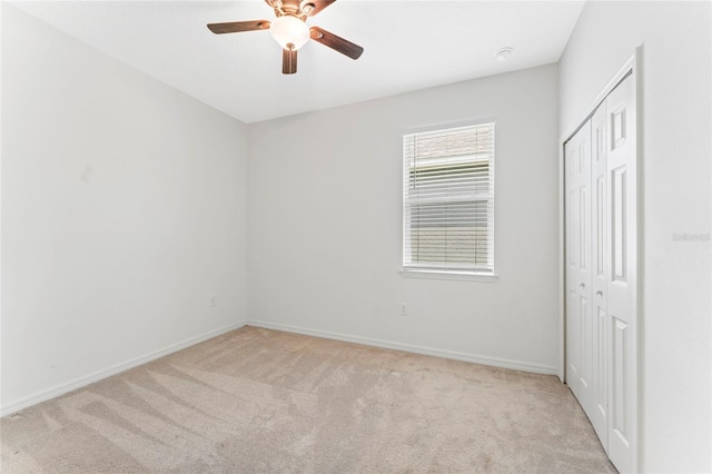 3 Oakleaf Way, Palm Coast, FL 32137 - unfurnished bedroom with carpet floors, baseboards, and a closet