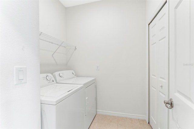 3 Oakleaf Way, Palm Coast, FL 32137 - clothes washing area with washing machine and dryer and baseboards