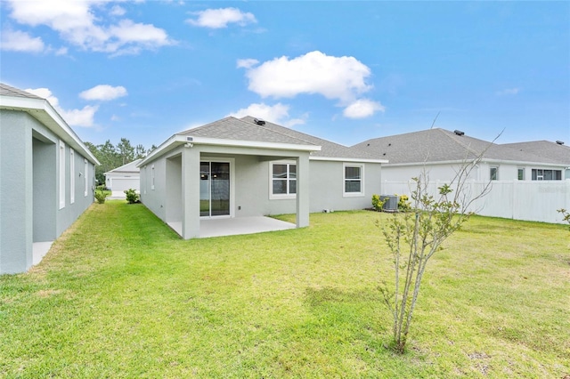 3 Oakleaf Way, Palm Coast, FL 32137 - back of property featuring a patio, stucco siding, and roof with shingles