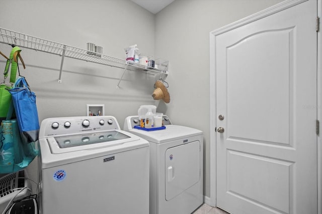 laundry area featuring independent washer and dryer