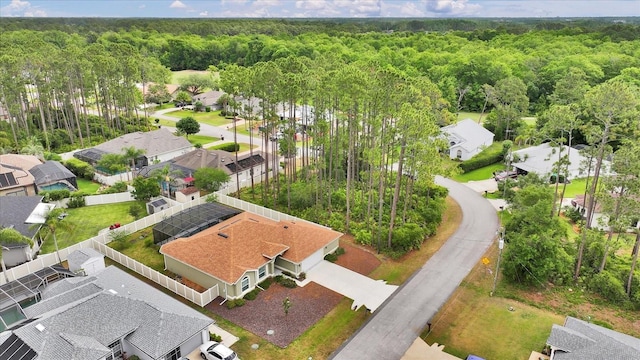 aerial view of residential area with a forest