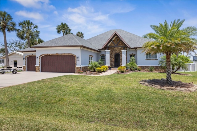 440 Lambert Ave, Flagler Beach, FL 32136 - view of front of house featuring stone siding, a garage, stucco siding, concrete driveway, and a shingled roof