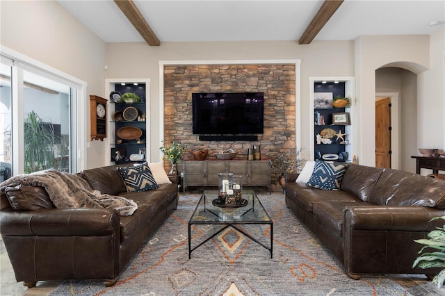 440 Lambert Ave, Flagler Beach, FL 32136 - living room with beam ceiling and arched walkways