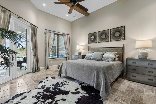 440 Lambert Ave, Flagler Beach, FL 32136 - bedroom featuring stone tile floors, access to exterior, baseboards, recessed lighting, and a high ceiling