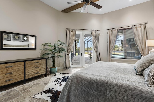 440 Lambert Ave, Flagler Beach, FL 32136 - bedroom with access to outside, french doors, stone tile floors, and ceiling fan