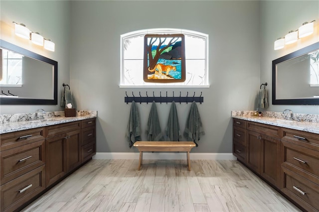 440 Lambert Ave, Flagler Beach, FL 32136 - bathroom with two vanities and baseboards