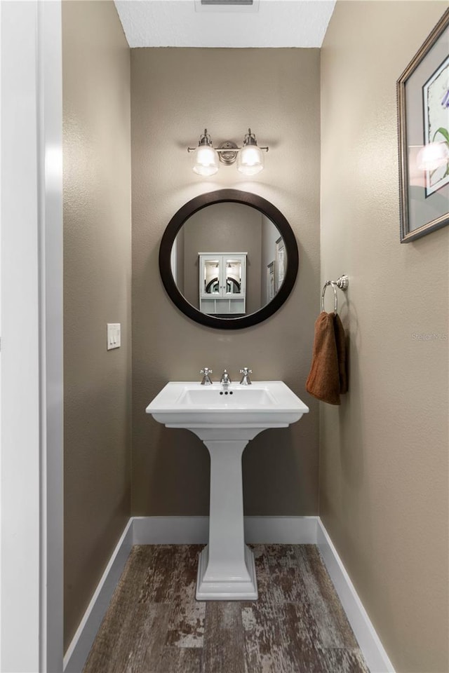 440 Lambert Ave, Flagler Beach, FL 32136 - bathroom featuring baseboards