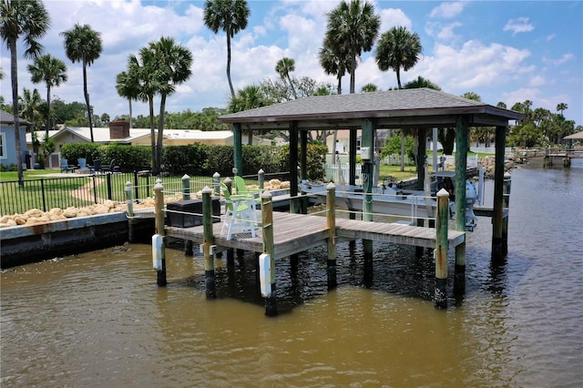 440 Lambert Ave, Flagler Beach, FL 32136 - dock featuring boat lift and a water view