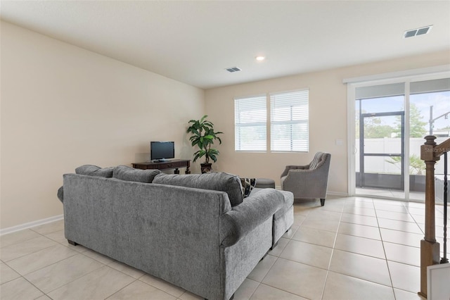 155 Redbud Rd, Palm Coast, FL 32137 - living area featuring light tile patterned flooring, baseboards, and recessed lighting