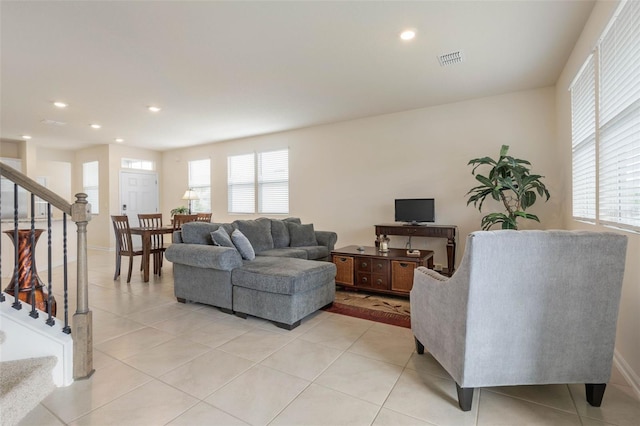 155 Redbud Rd, Palm Coast, FL 32137 - living area featuring stairs, plenty of natural light, light tile patterned floors, and recessed lighting