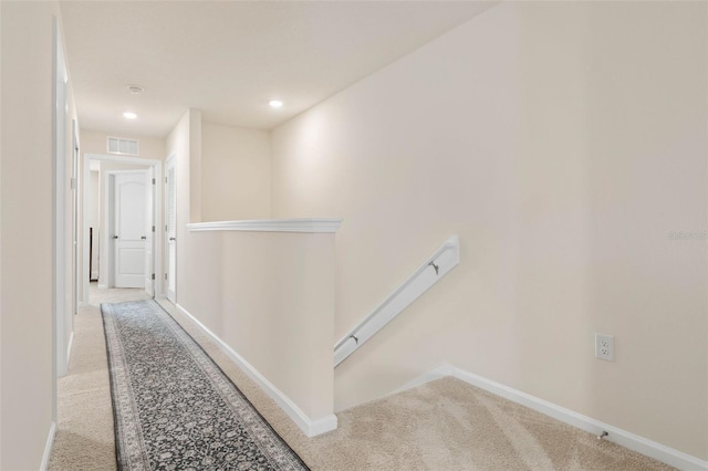 155 Redbud Rd, Palm Coast, FL 32137 - hall with carpet flooring, an upstairs landing, baseboards, and recessed lighting