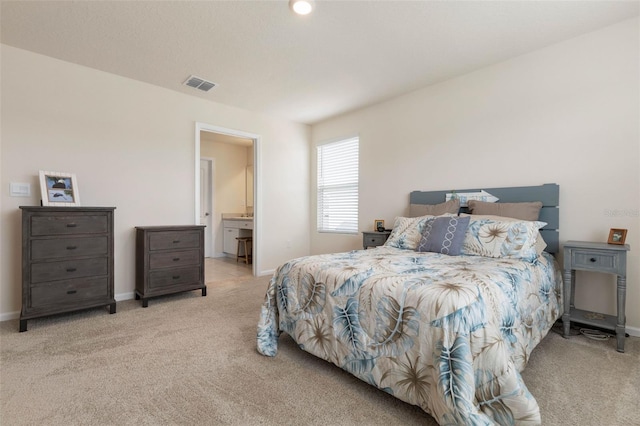 155 Redbud Rd, Palm Coast, FL 32137 - carpeted bedroom featuring baseboards and ensuite bathroom