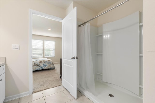 155 Redbud Rd, Palm Coast, FL 32137 - full bathroom featuring tile patterned floors, a shower stall, and vanity