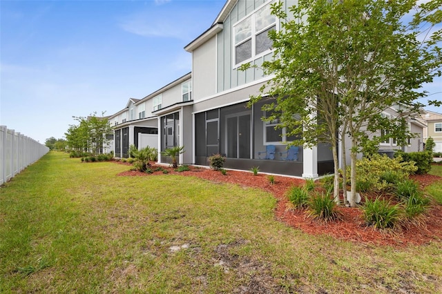 155 Redbud Rd, Palm Coast, FL 32137 - view of yard with a sunroom