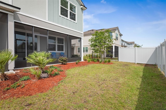 155 Redbud Rd, Palm Coast, FL 32137 - view of yard featuring a sunroom